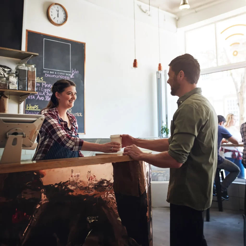small business owner assisting customer