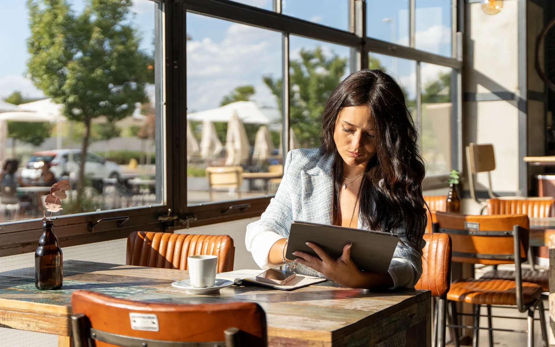 woman reading latest economic development news