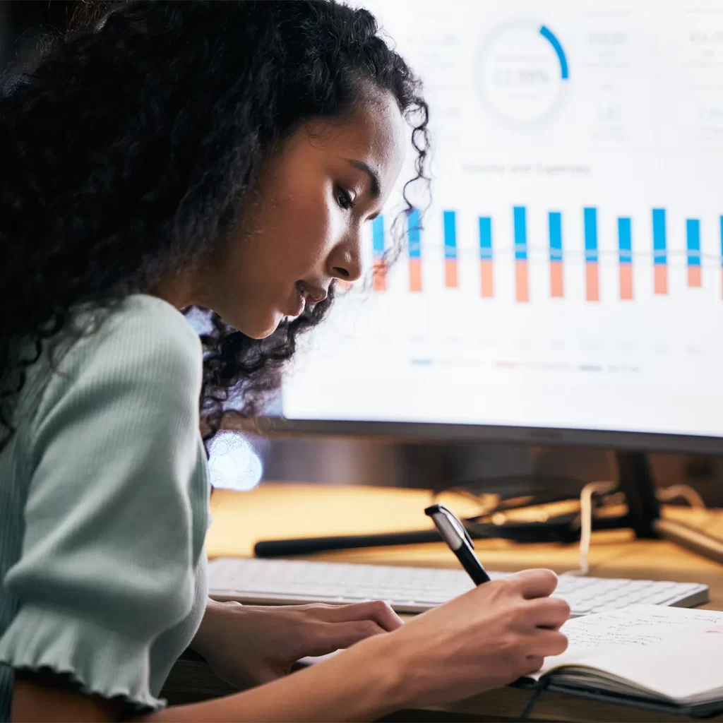 woman researching economic impact